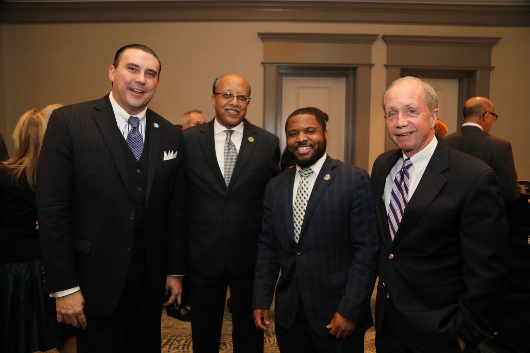 Michael McMillan,Dr. Mulugheteteferi, Darryl Jones, Tom Irwin